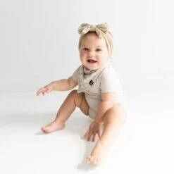 Bib In Oat Leopard 6 Bib In Oat Leopard -Kyte baby Store kyte baby bib oat leopard bib in oat leopard 32329612197999