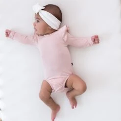 Ribbed Long Sleeve Ruffle Leotard In Blush -Kyte baby Store kyte baby ribbed long sleeve ruffle bodysuit ribbed long sleeve ruffle leotard in blush 32733116891247