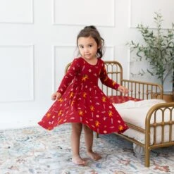 Long Sleeve Twirl Dress In Gryffindor™ -Kyte baby Store kyte baby toddler long sleeve twirl dress long sleeve twirl dress in gryffindor 32475941896303