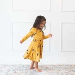Long Sleeve Twirl Dress In Hufflepuff™ 8 Long Sleeve Twirl Dress In Hufflepuff™ -Kyte baby Store kyte baby toddler long sleeve twirl dress long sleeve twirl dress in hufflepuff 32475942420591